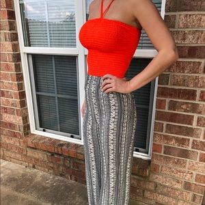 Jealous tomato orange jumpsuit.